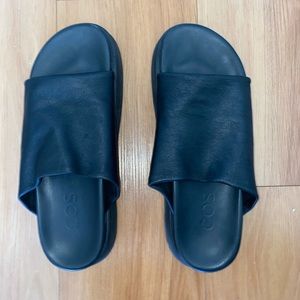 Lightly worn leather sandals